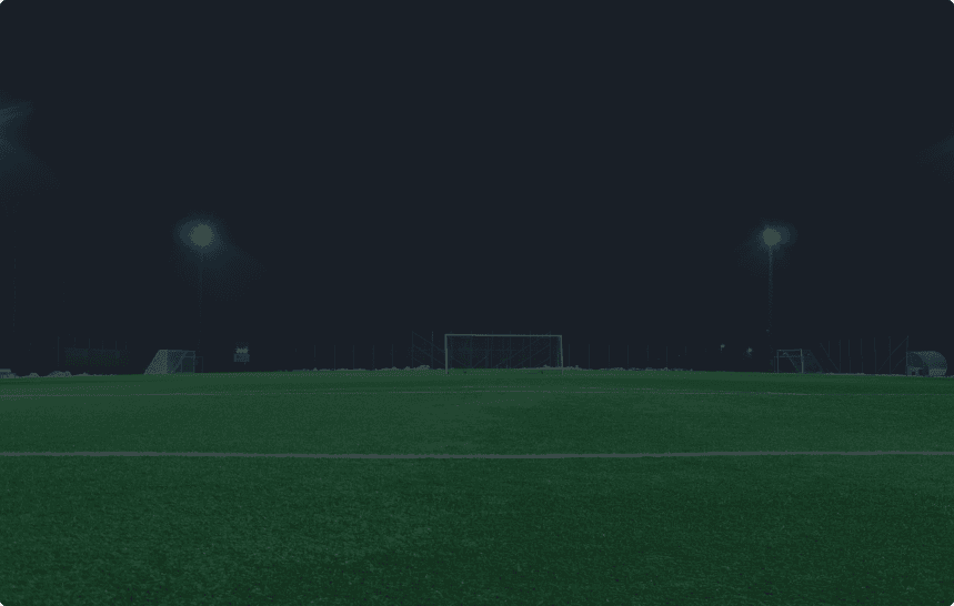 a panaromic view of a football field, with goal post in the center of the view